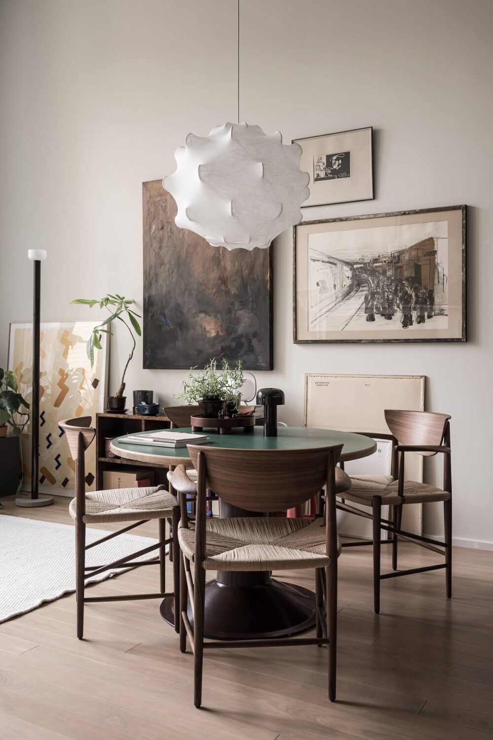 A Monochrome Loft with High Ceilings and Art 15 dining table and art