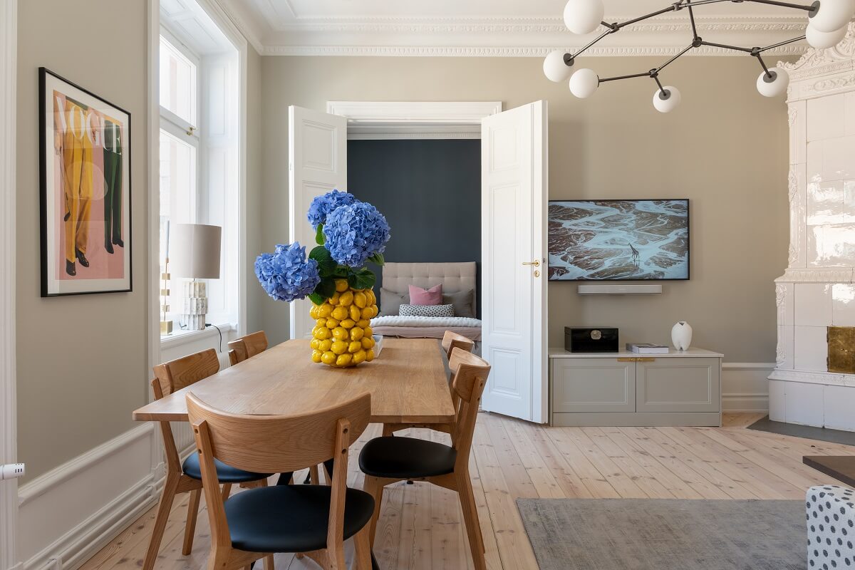 A Light Renovated Apartment in Stockholm 5 dining table in living rom