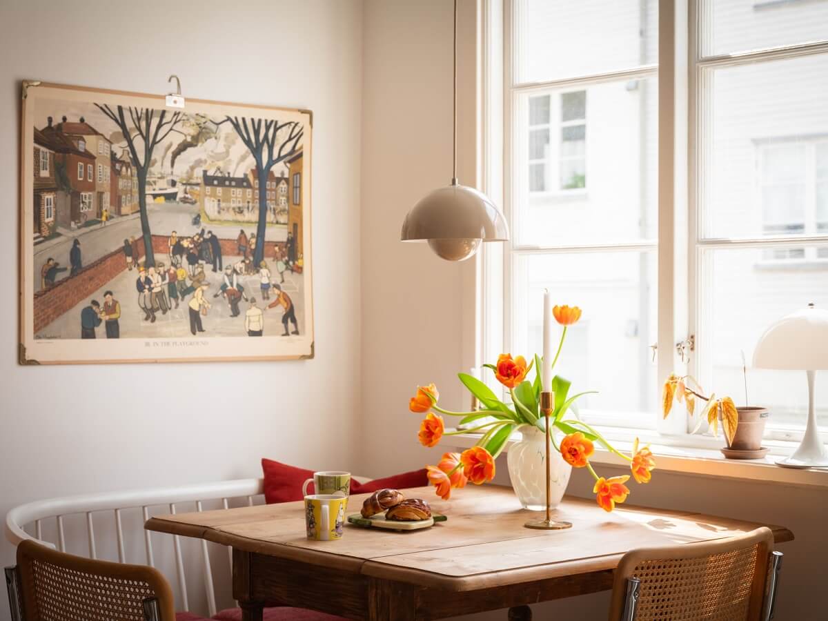 Warm Orange Tones in a Small Apartment 6 dining table with bench