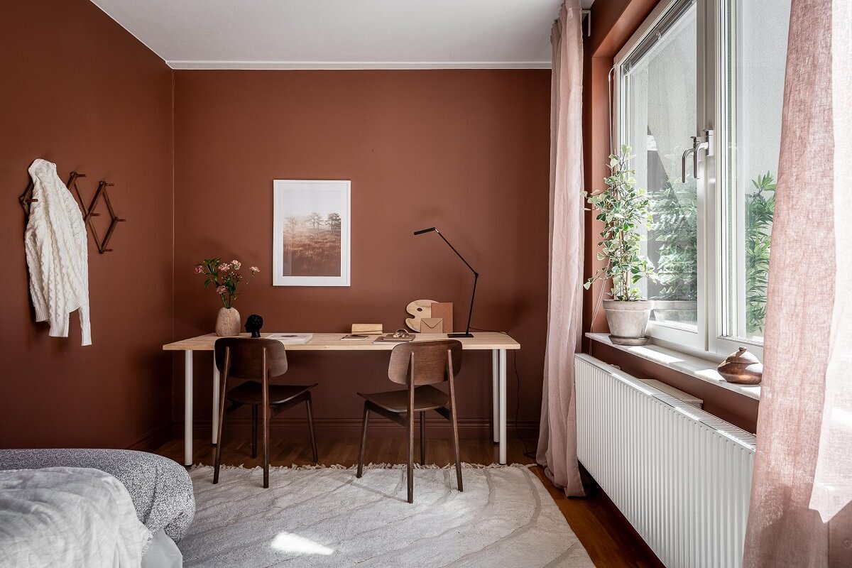 Floor-to-Ceiling Bookcases and Windows in a Loft Style Apartment 21 double desk in earthy brown bedroom nordroom