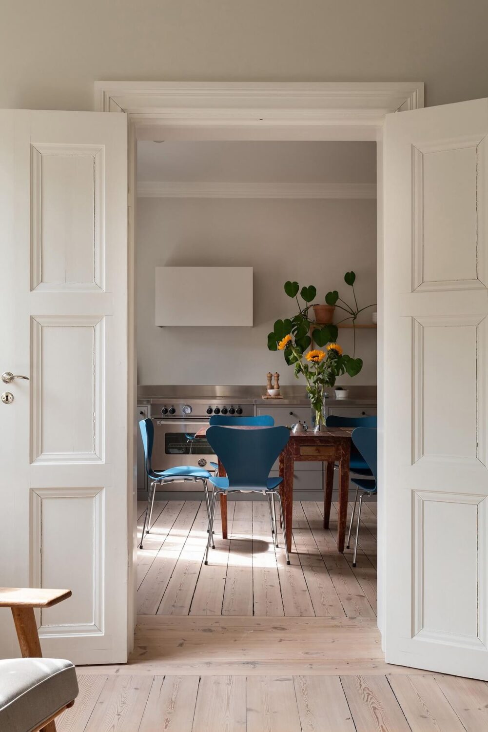Light Rooms in a Renovated Historic Apartment in Stockholm 7 double wooden doors kitchen nordroom