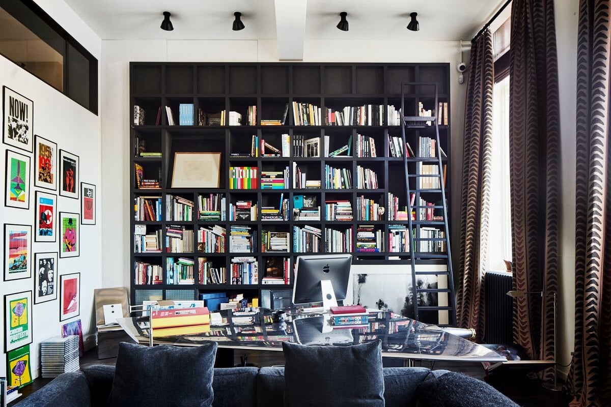 A Monochrome London Loft Filled with Art 18 floor to ceiling bookcases monochrome loft apartment london nordroom