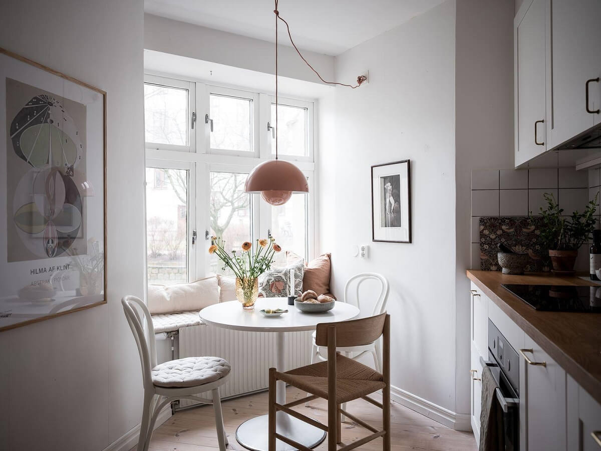 A Light Two Bedroom Apartment in Gothenburg 20 flowerpot pendant kitchen table