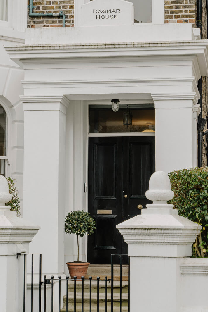 Neutral Tones and Original Features in an English Townhouse 21 front door