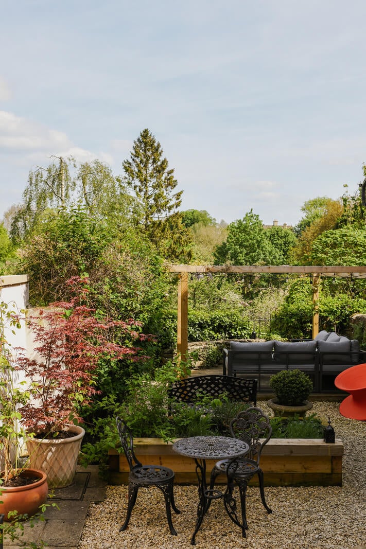 A Rich Color Palette in a Historic English Home 27 garden table