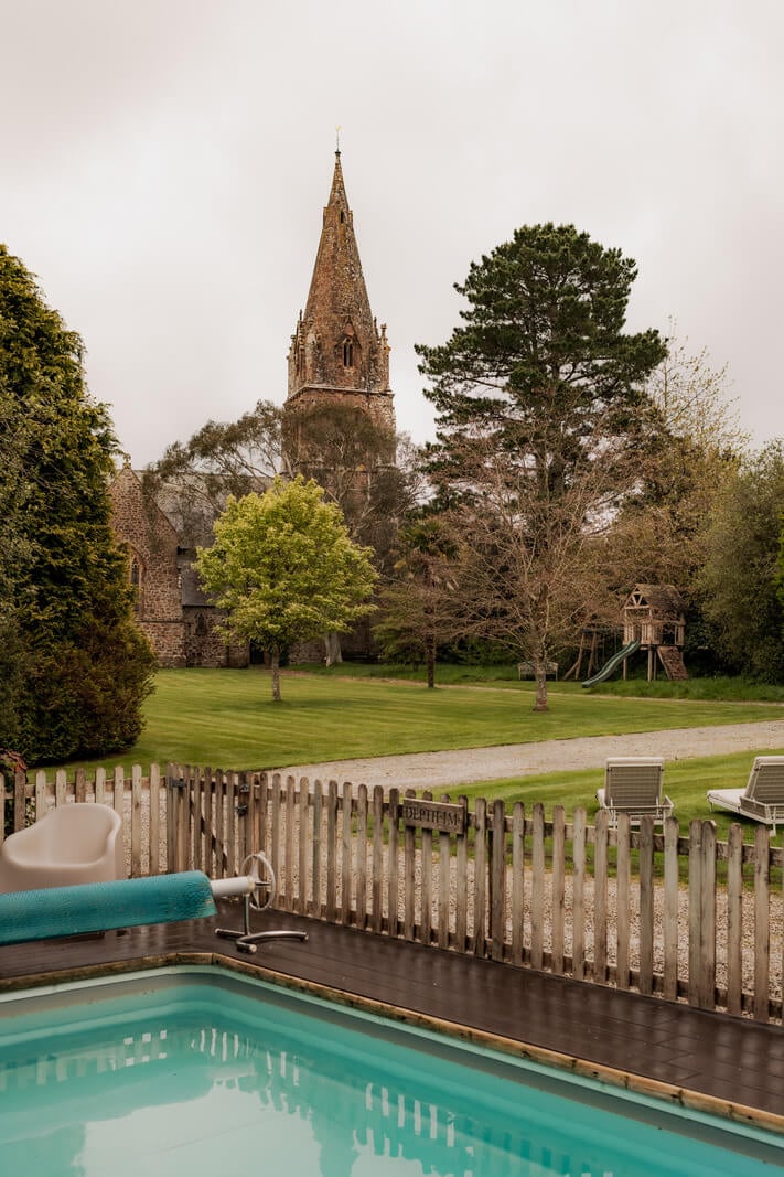 A Charming Gothic-Style Home with Original Details 33 garden with swimming pool