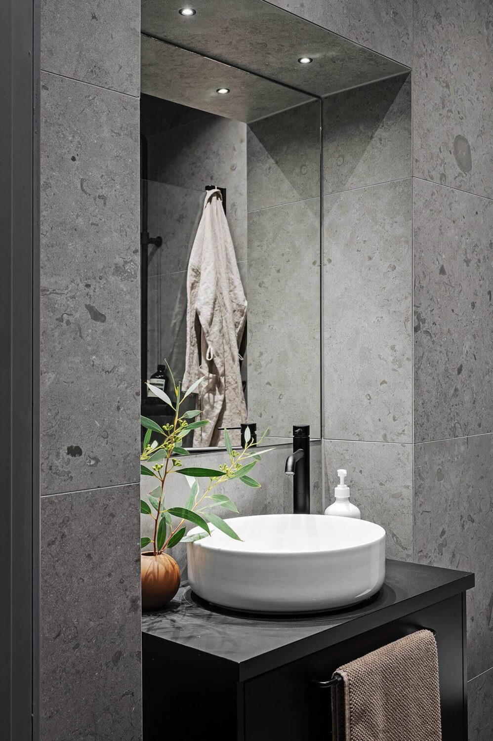 A Luxurious Renovated Apartment with Dark Gray Walls 25 gray bathroom