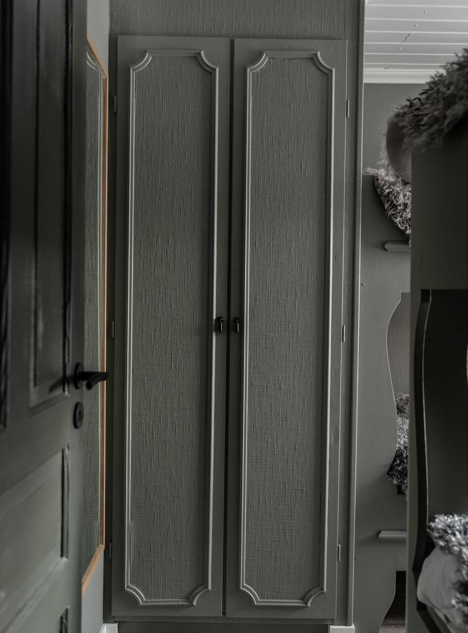 A Gray Swedish Log House Decorated for Christmas 16 gray bedroom wardrobe