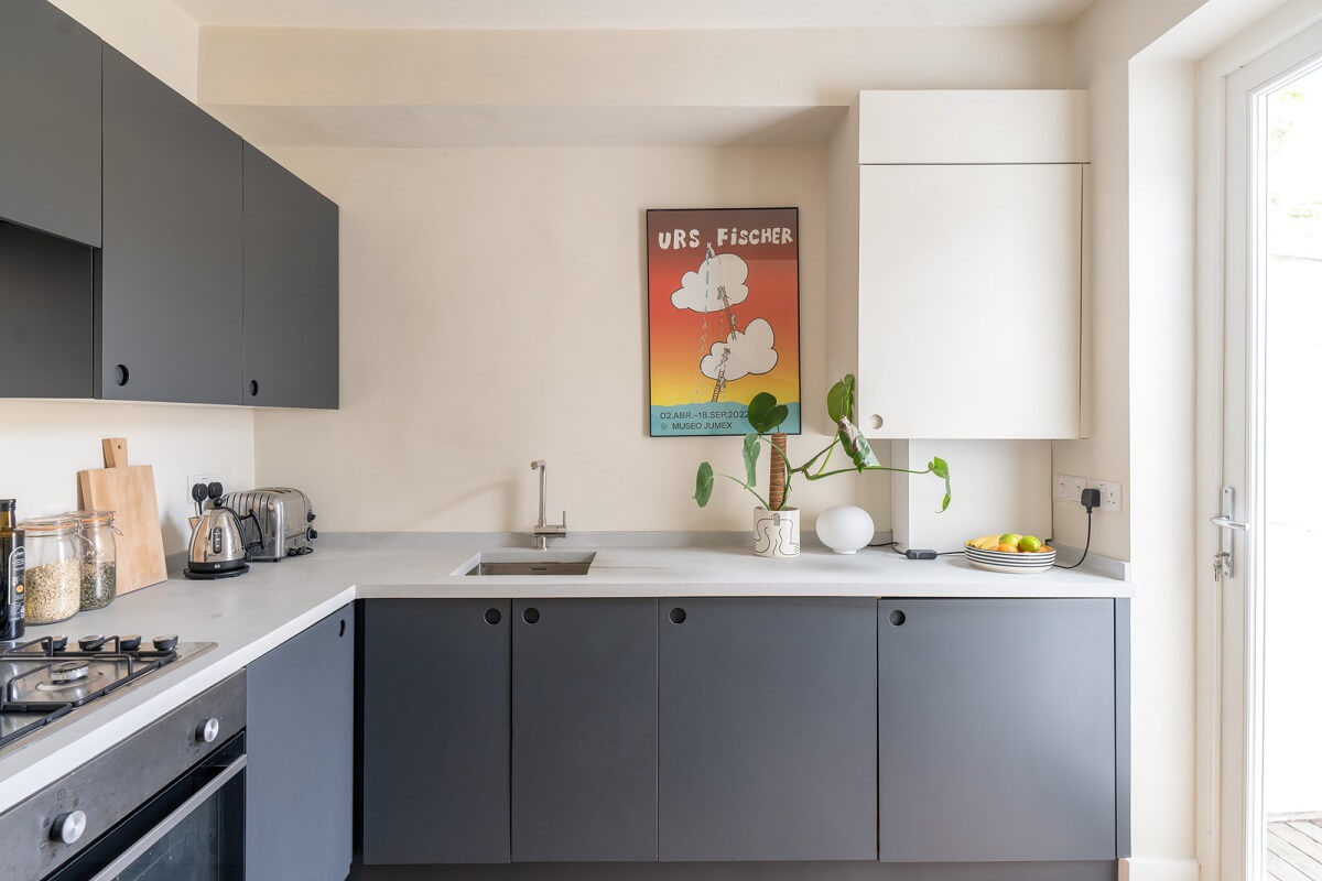 A Tiny Maisonette with Original Details in London 7 gray cabinets
