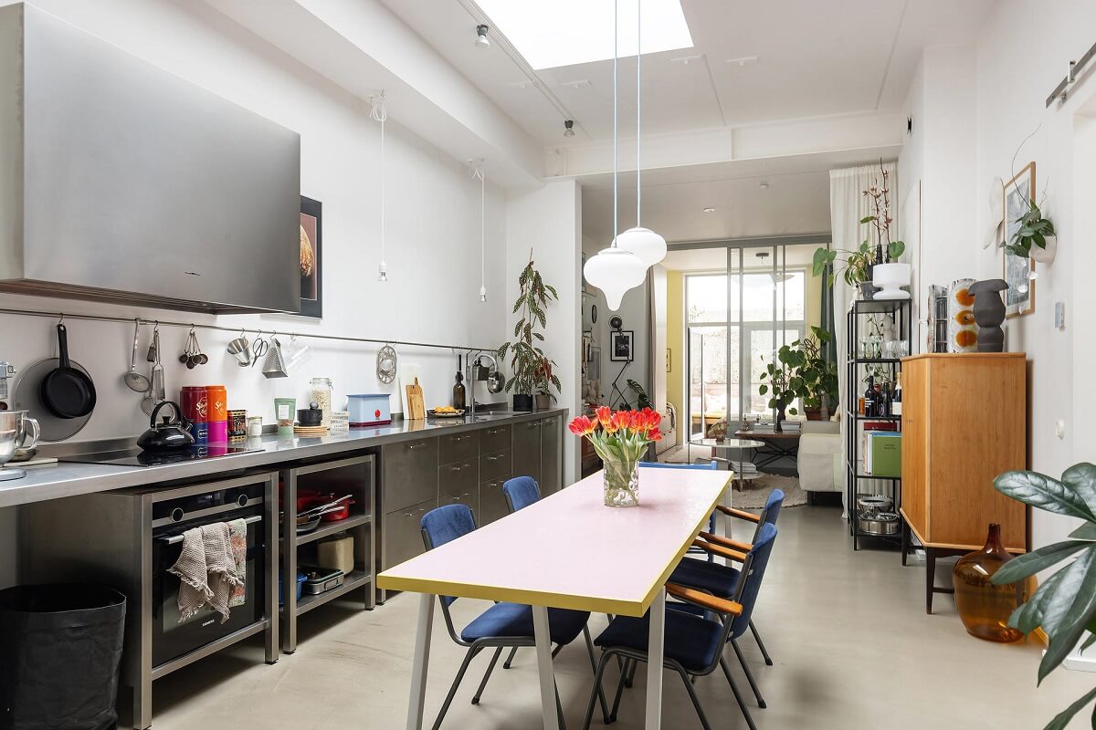A Unique Basement Apartment in Stockholm 14 gray kitchen and dining table
