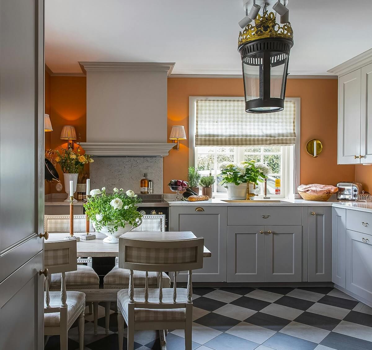 A Classic and Luxurious Lakeside Home in Sweden 11 gray kitchen orange wall luxurious summer house sweden nordroom