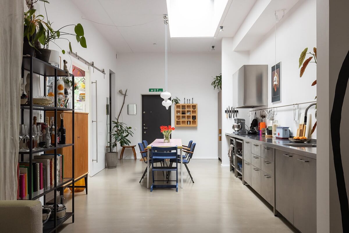 A Unique Basement Apartment in Stockholm 13 gray kitchen with skylight