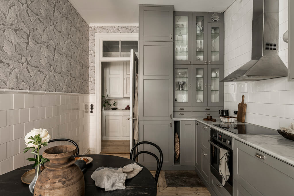 Wallpaper and Historic Charm in a Swedish Apartment 21 gray kitchen with wallpaper