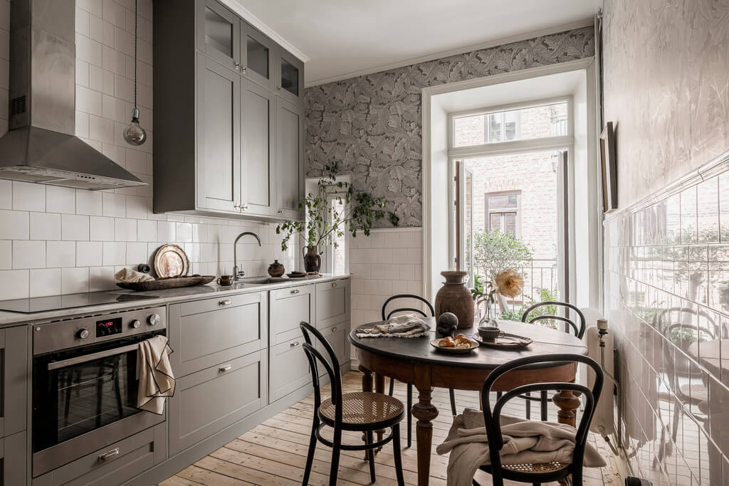 Wallpaper and Historic Charm in a Swedish Apartment 13 gray kitchen with william morris wallpaper nordroom