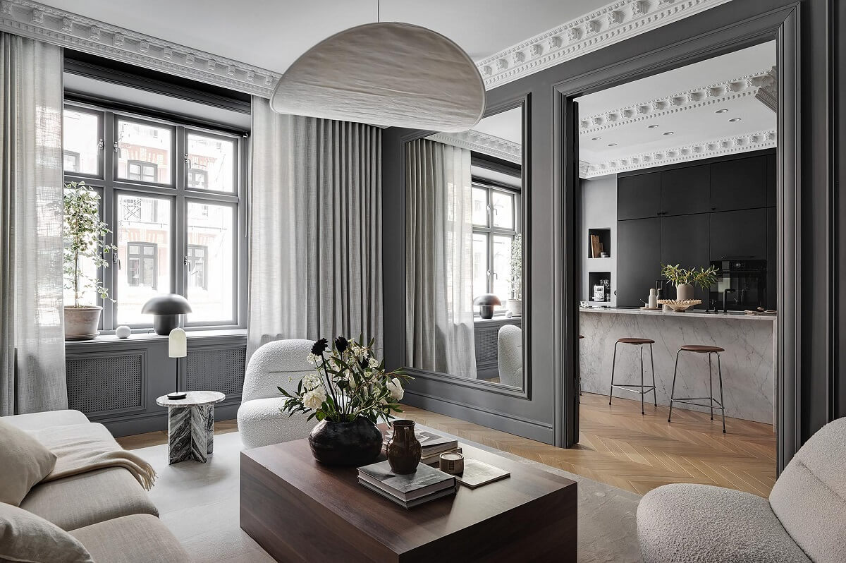 gray living room with large mirror