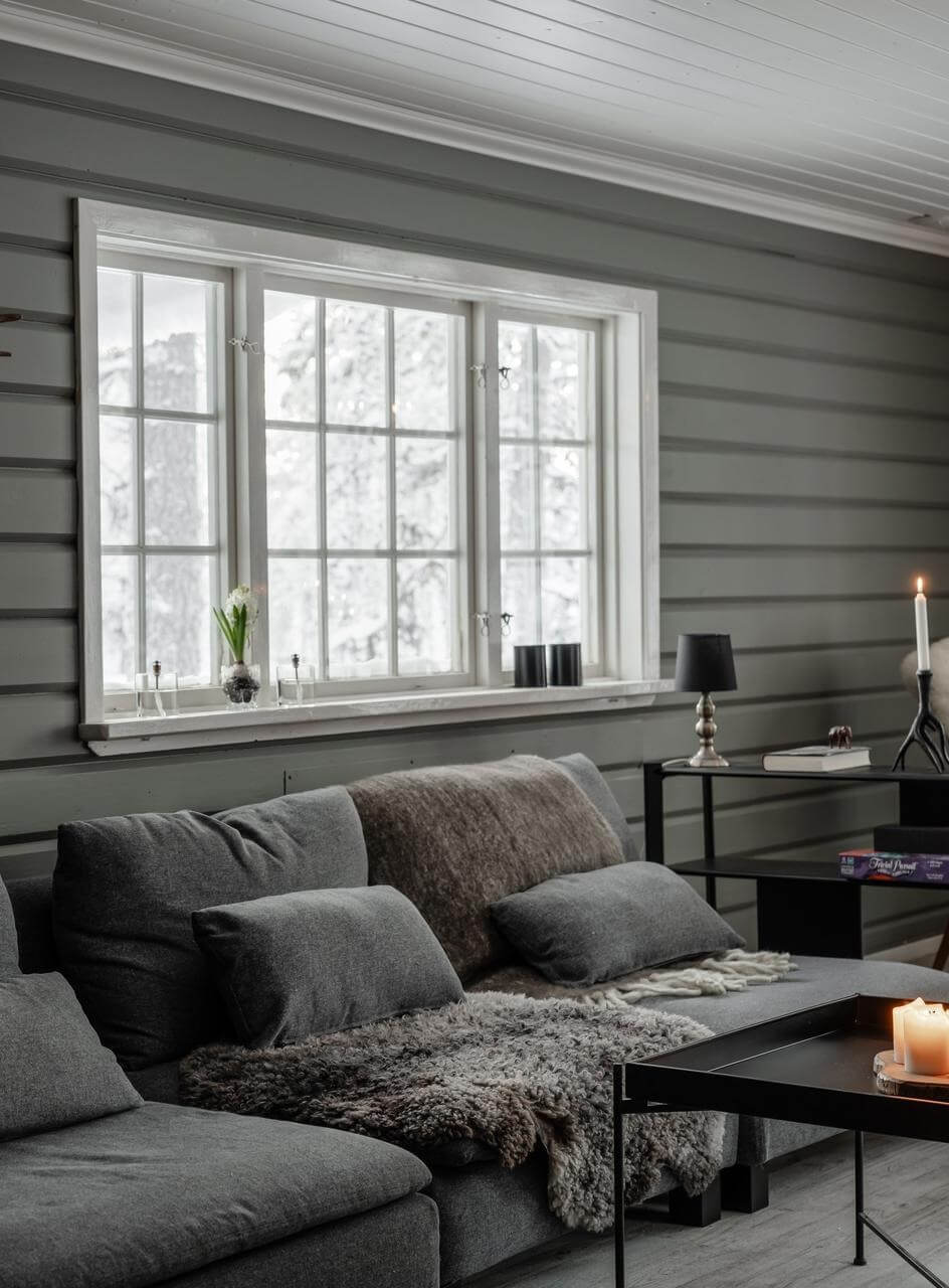 A Gray Swedish Log House Decorated for Christmas 3 gray log house living room nordroom