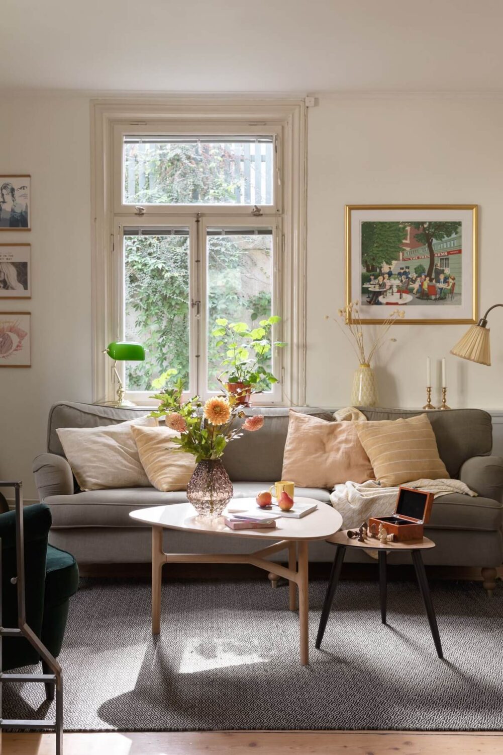 A Swedish Duplex with a Unique Wood and Pastel Colored Kitchen 10 gray sofa living room detail