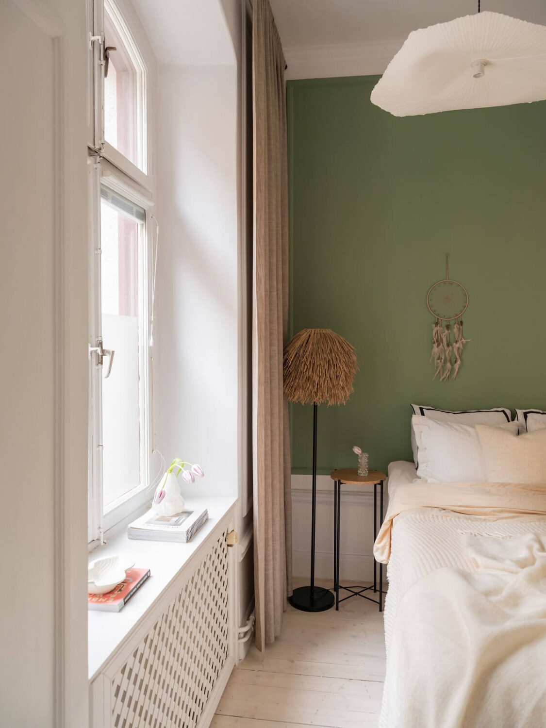A Small, Tastefully Renovated Apartment in Stockholm 15 green and white tiny bedroom