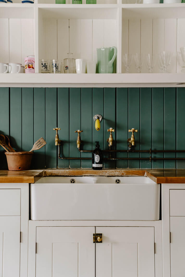 An 18th-Century Historic House with an Amazing Kitchen 4 green backsplash and white cabinets