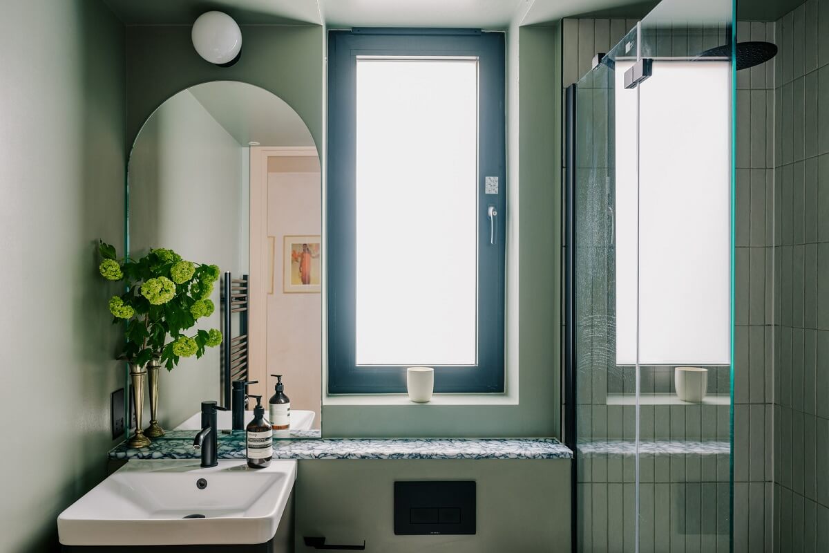 Warm Color Tones in a London Apartment with a Garden 12 green bathroom