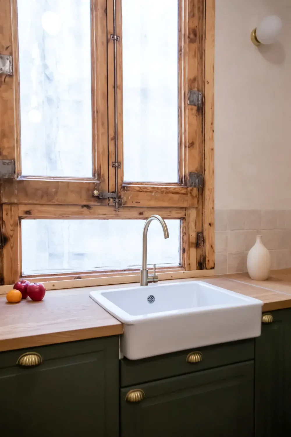 A Serene Apartment in Barcelona's Gothic Quarter 6 green cabinets and old wooden window