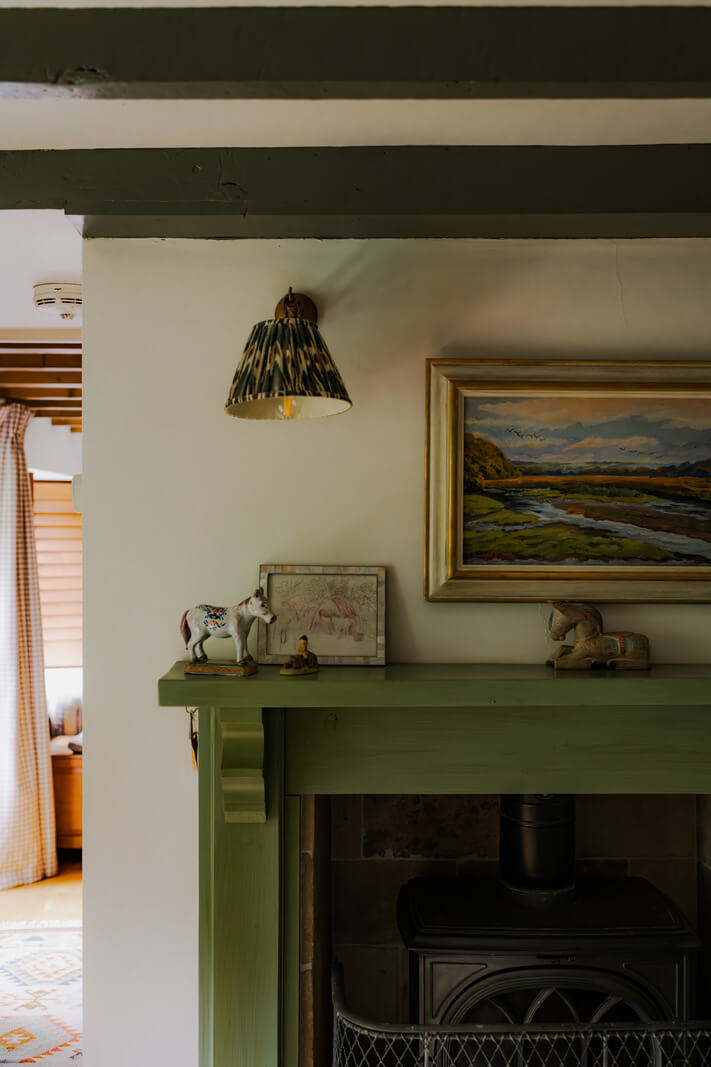 Ochre Yellow and Green Tones in a Cozy Welsh Cottage 4 green fireplace mantel
