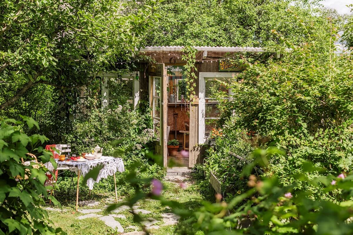 A Historic Swedish Country House with a Beautiful Garden 24 green garden with shed