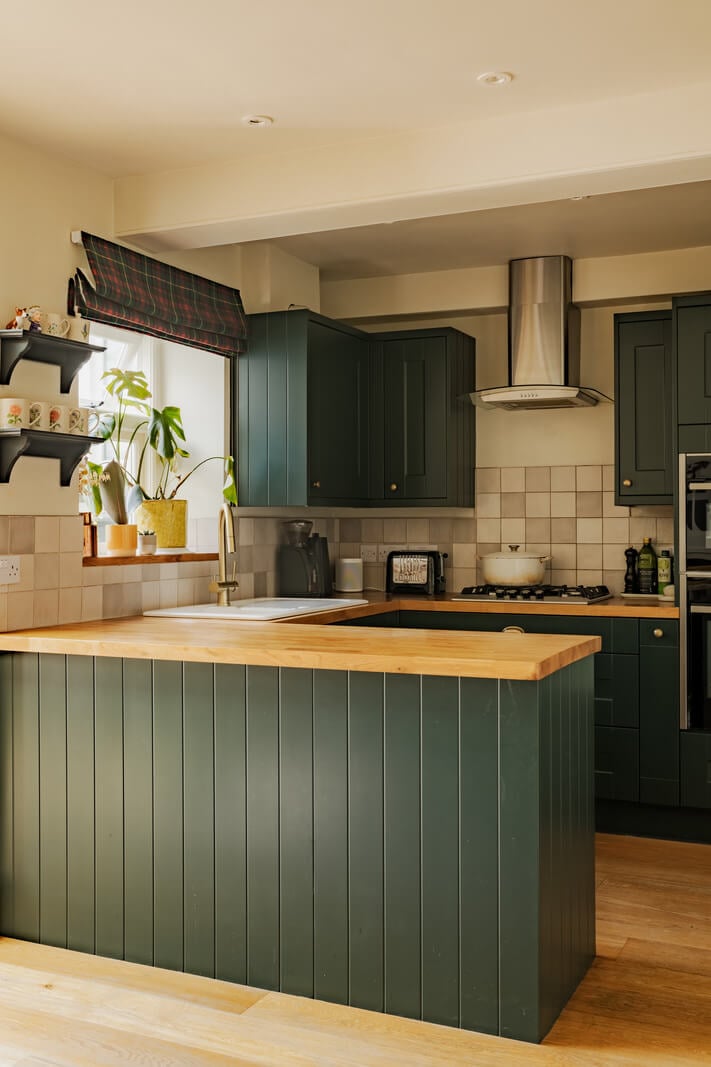 A Rich Color Palette in a Historic English Home 6 green kitchen