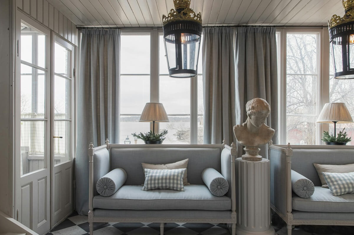 A Classic and Luxurious Lakeside Home in Sweden 2 hall with benches luxurious summer house sweden nordroom