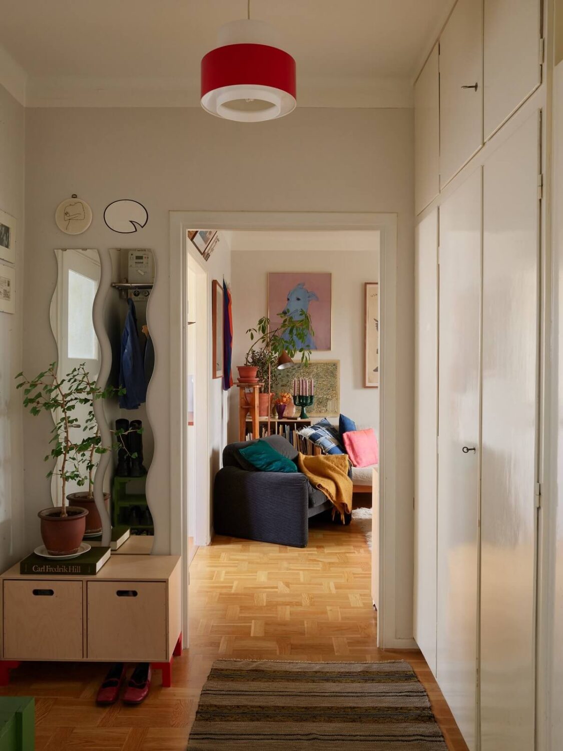 A Swedish Apartment with a Restored Original Kitchen 19 hallway built in wardrobes