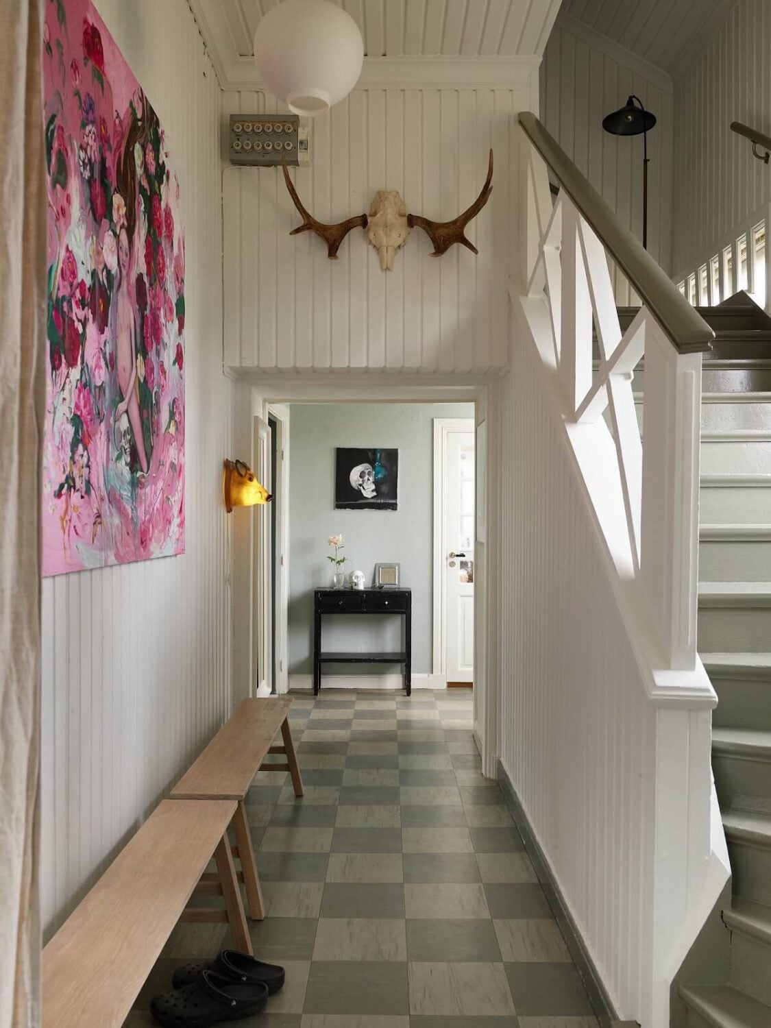 A Charming School Conversion in Sweden 14 hallway with checkerboard floor