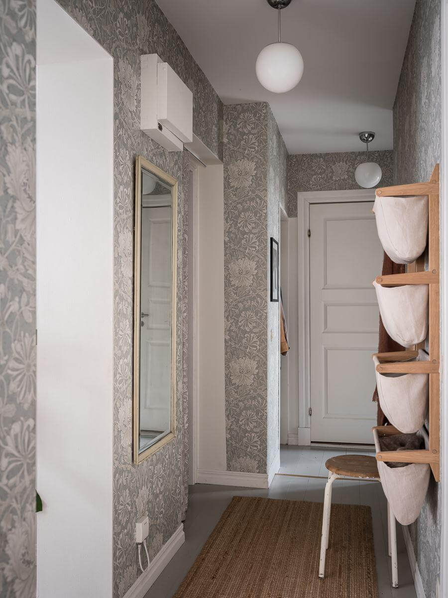 A Light Two Bedroom Apartment in Gothenburg 26 hallway with storage baskets nordroom