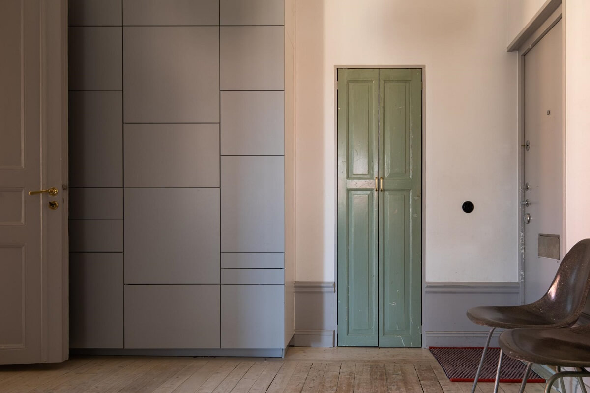 A Corner Apartment with an Industrial Style Kitchen 26 hallway with wardrobes