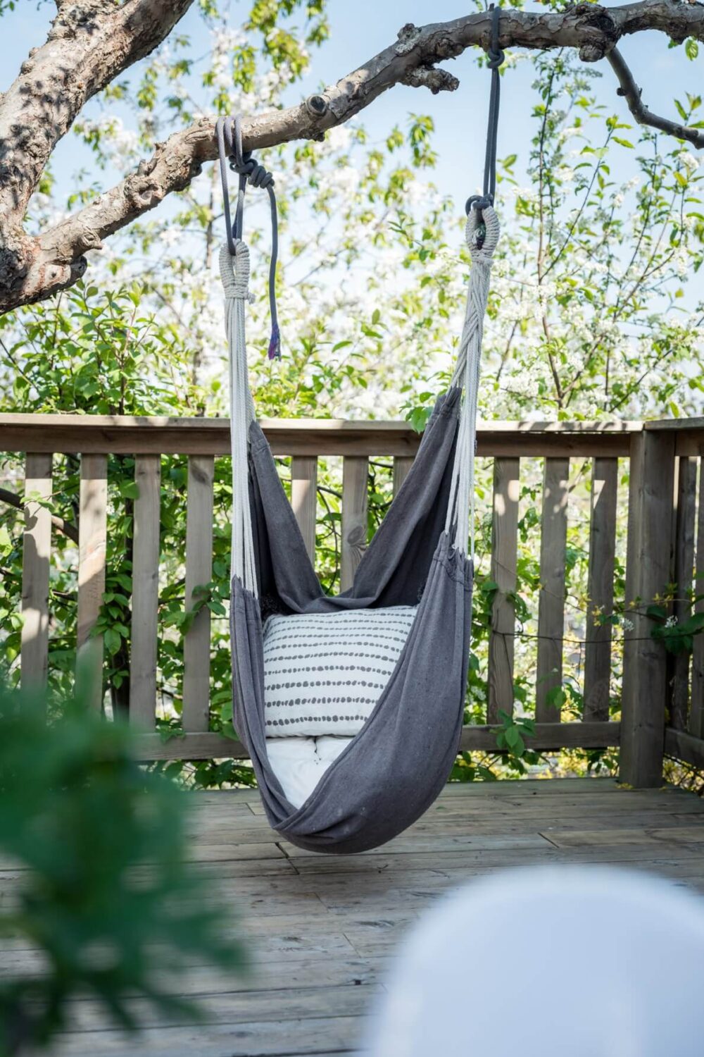 A Pink Swedish House with a Lovely Garden 27 hanging chair