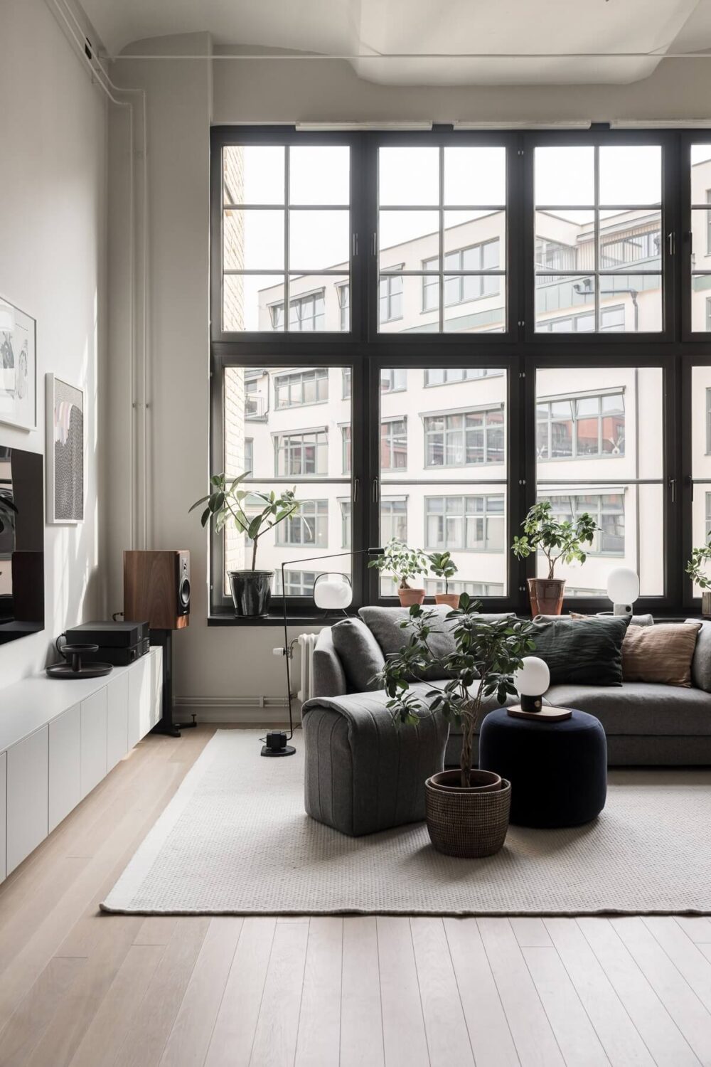 A Monochrome Loft with High Ceilings and Art 2 high ceilings in loft living room