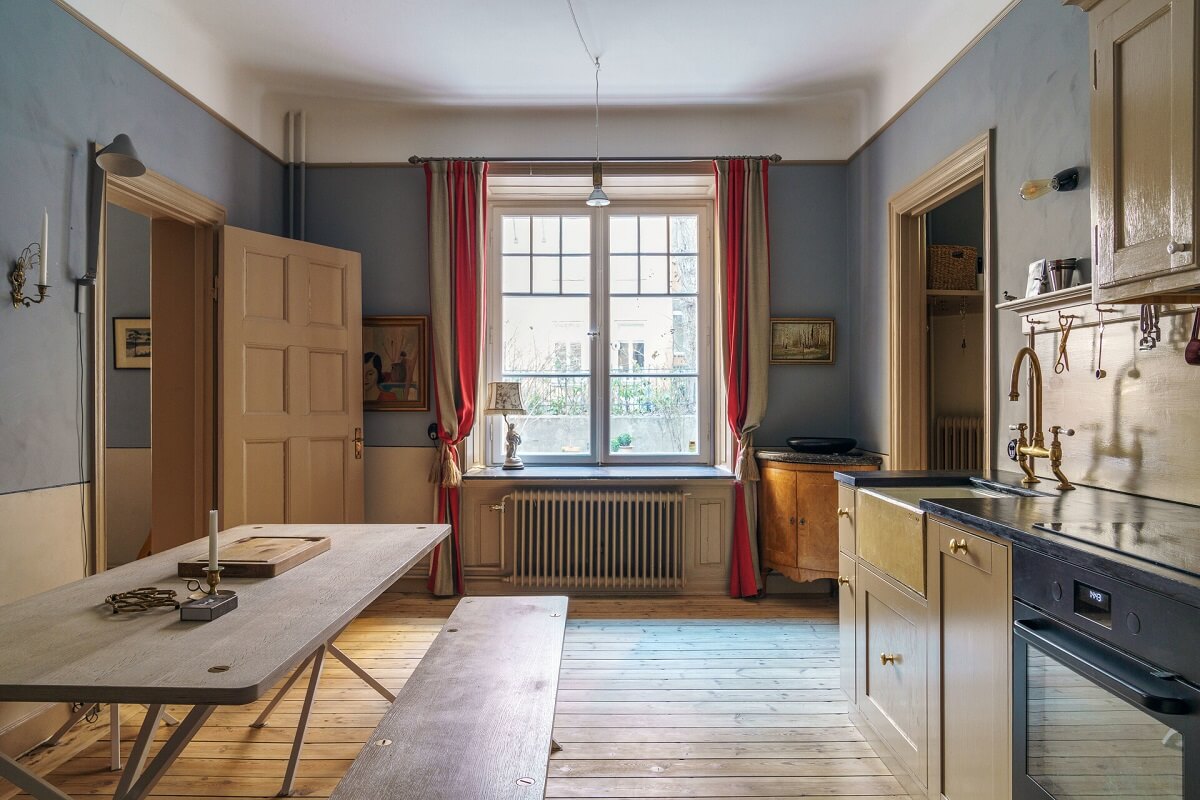 A Unique Courtyard Home in Stockholm 2 historic kitchen with blue walls A Unique Courtyard Home in Stockholm