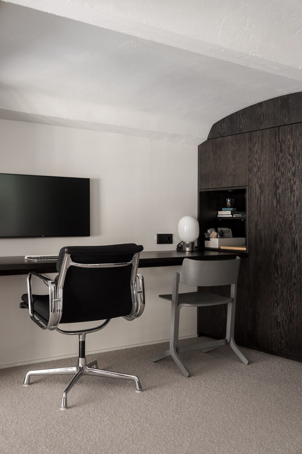 A Monochrome Loft with High Ceilings and Art 33 home office in loft space