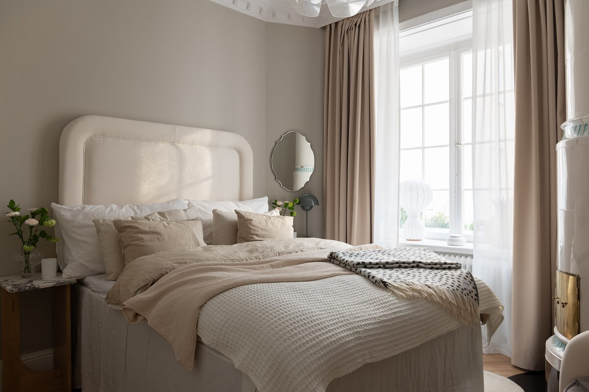 A Classic Look for a Swedish Apartment 12 hotel style bedroom with light gray walls nrodroom