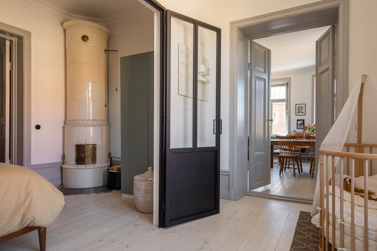 A Corner Apartment with an Industrial Style Kitchen 22 industrial door bedroom