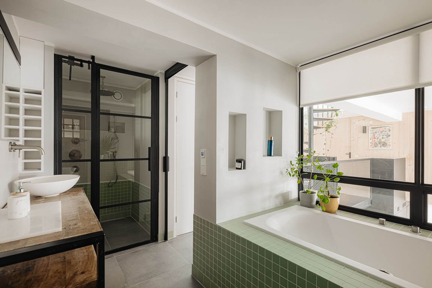 A Modern Loft-Style School Conversion in Amsterdam 22 industrial style bathroom green tiles