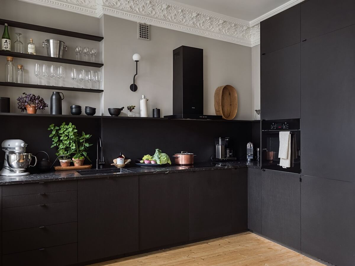 A Gray Stockholm Apartment with a Black Kitchen 7 kitchen black cabinets and gray walls nordroom