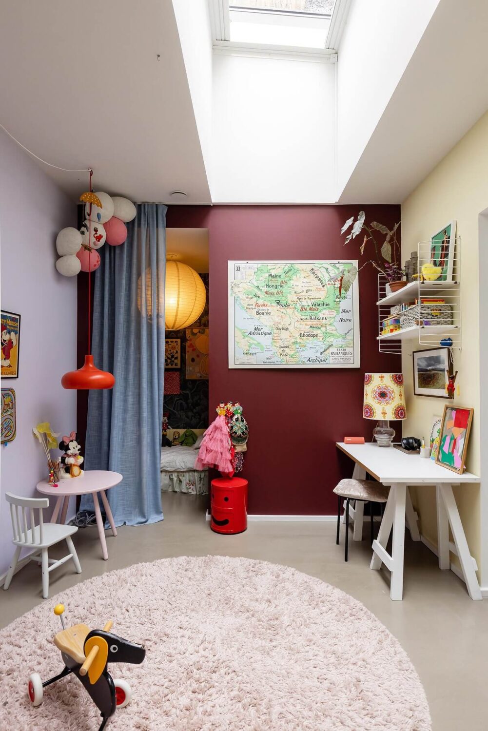 A Unique Basement Apartment in Stockholm 20 kids bedroom with skylight and deep red wall nordroom