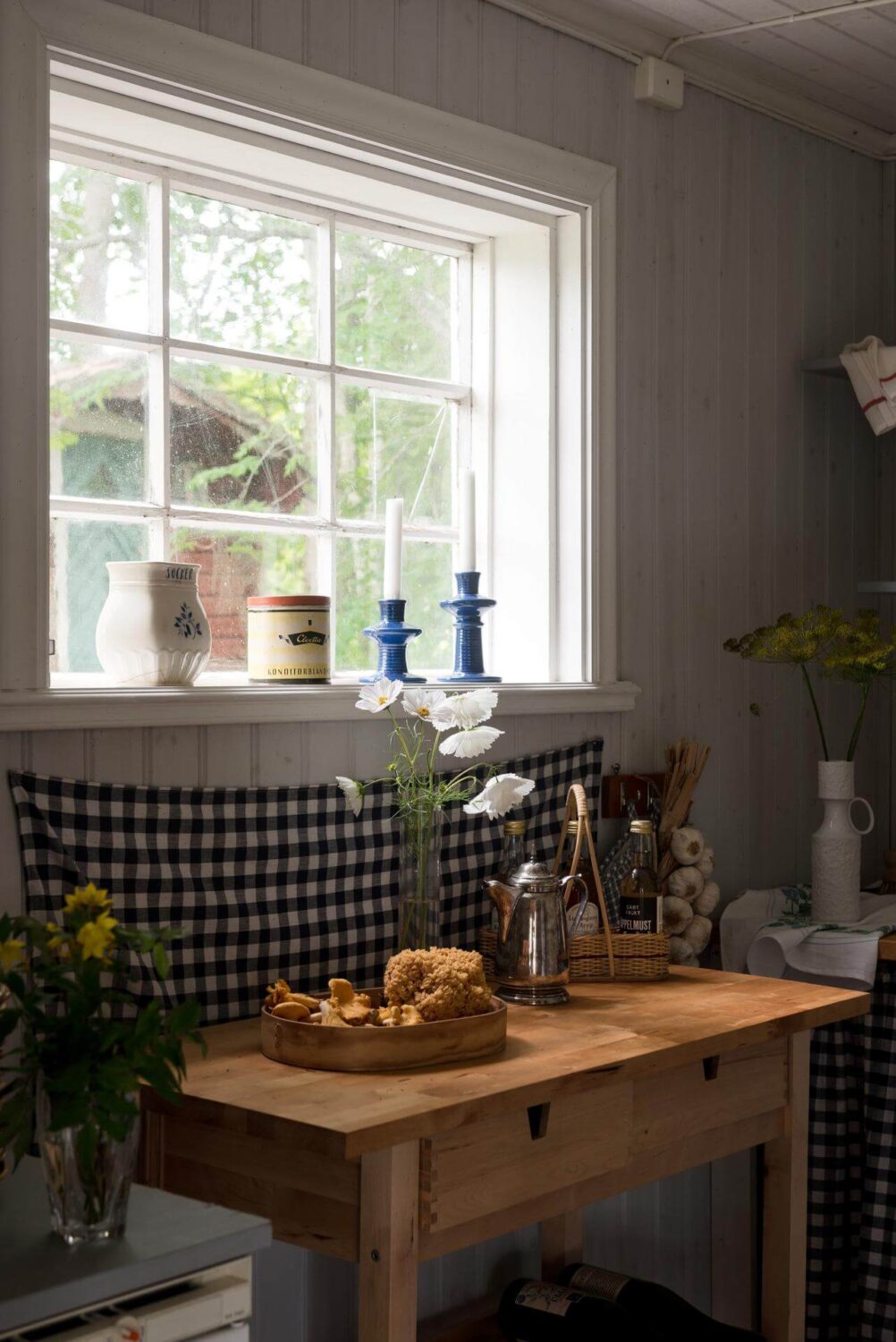 A Traditional Summer House Cabin in Sweden 9 kitchen bench traditional wooden summer cottage sweden nordroom