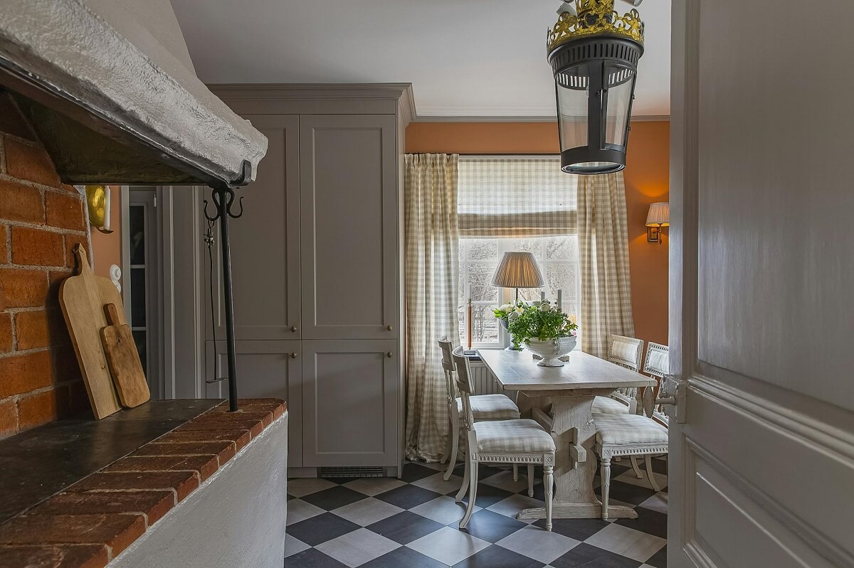 A Classic and Luxurious Lakeside Home in Sweden 12 kitchen checkerboard floor luxurious summer house sweden nordroom