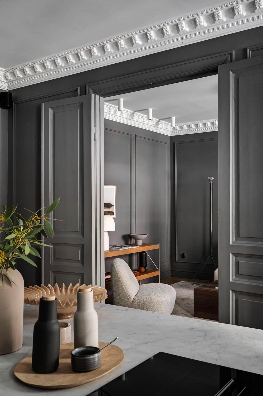 A Luxurious Renovated Apartment with Dark Gray Walls 13 kitchen detail