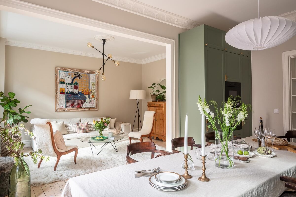A Turn of the Century Apartment with a Green Kitchen 7 kitchen view into living