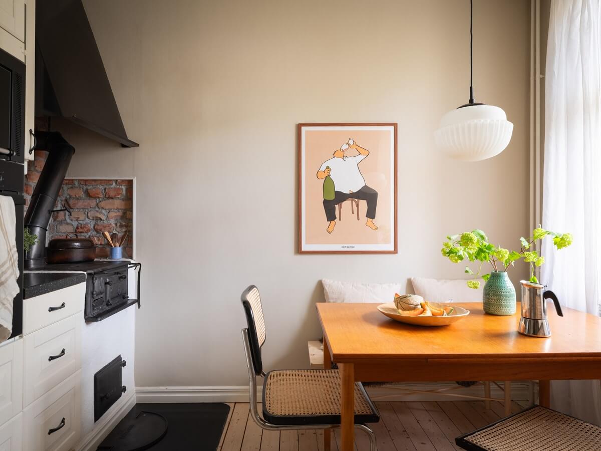Original Details in a Light-Filled Swedish Apartment 6 kitchen with dining table