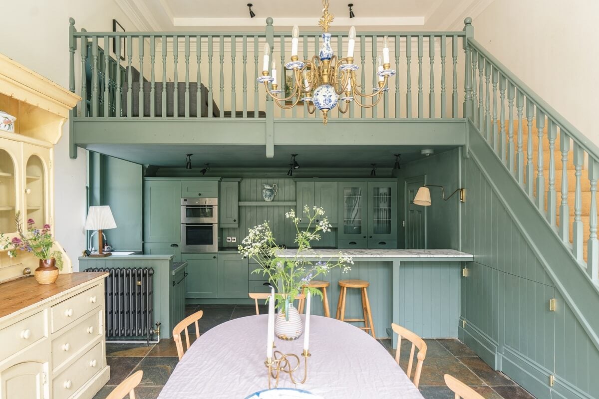 Grand Rooms and Vibrant Colors in an English Country Home 7 kitchen with loft area painted green smoke nordroom