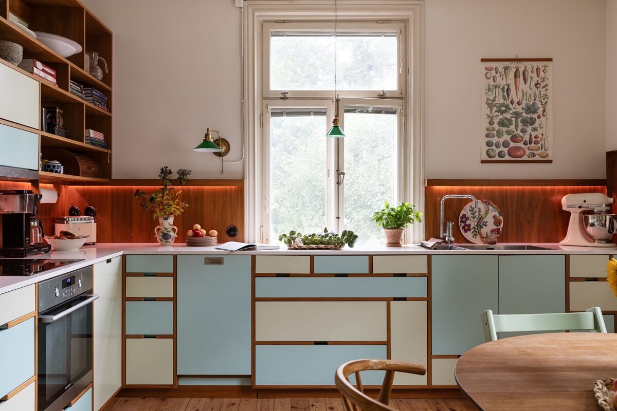 A Swedish Duplex with a Unique Wood and Pastel Colored Kitchen 2 kitchen with pastel fronts and open cabinets