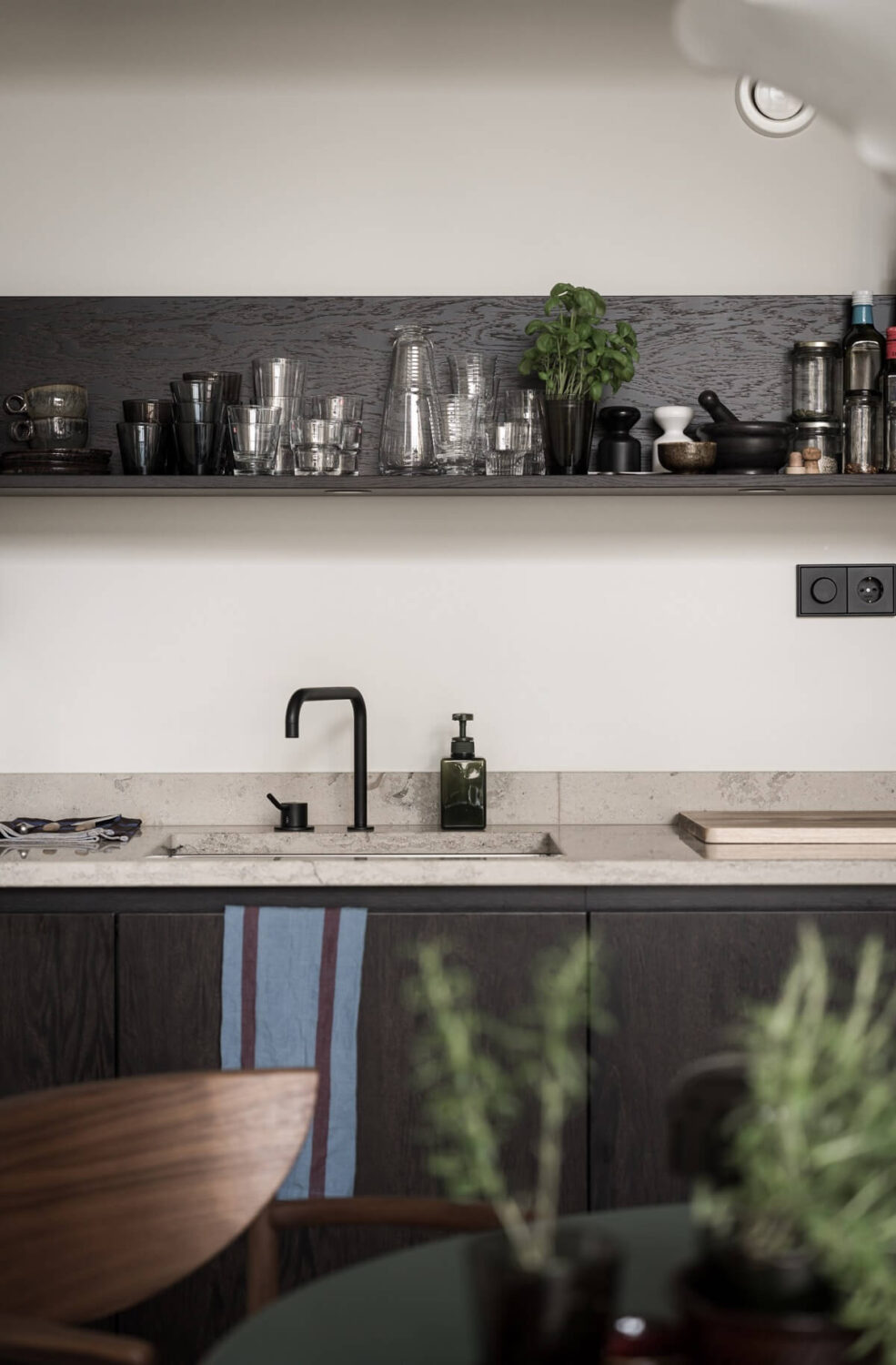 A Monochrome Loft with High Ceilings and Art 24 kitchen with shelf